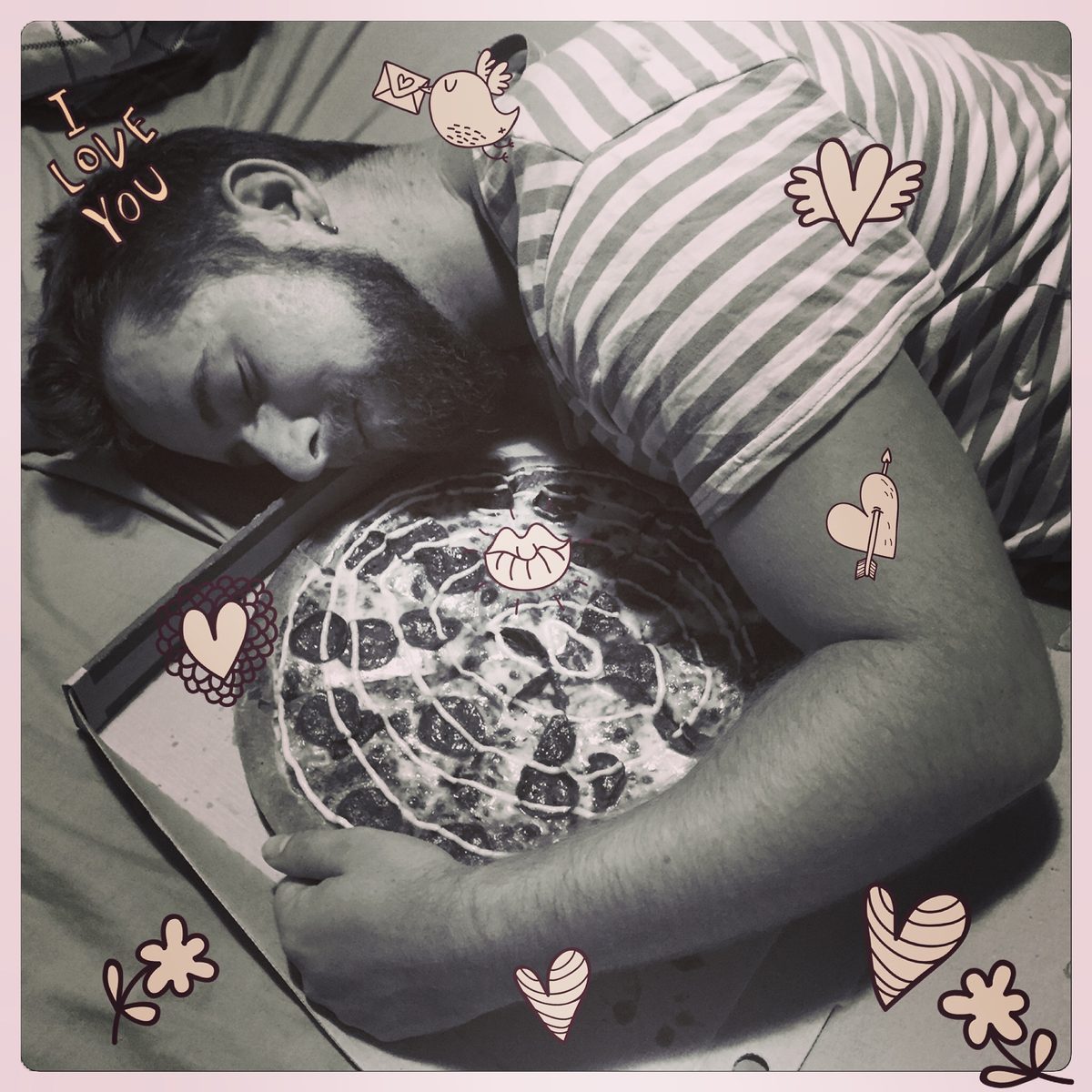 Curled up with a beautiful pizza, dreaming cheese dreams.