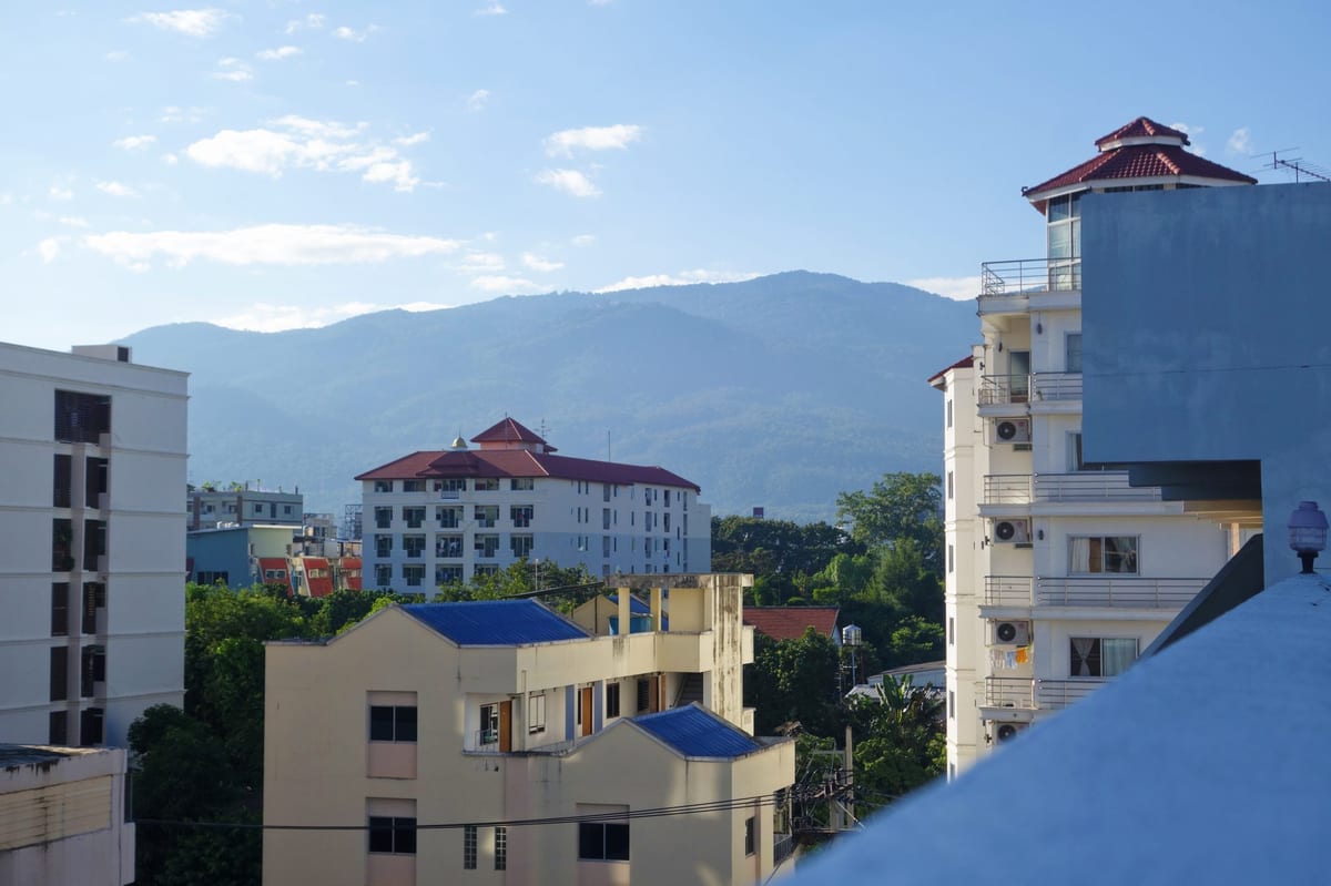 Chiang Mai mountains, as viewed from the roof of apartment building.