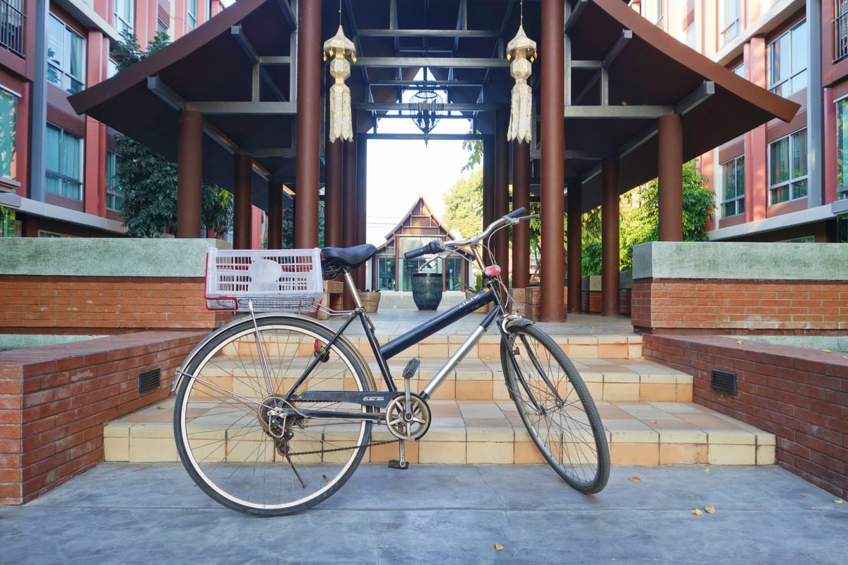 Road bike parked up outside Chiang Mai condo.