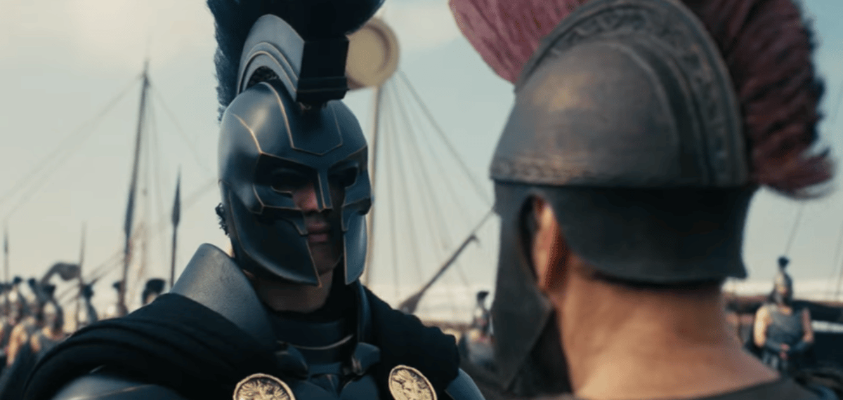 Two armoured warriors face off amid the ships in Nolan's The Odyssey